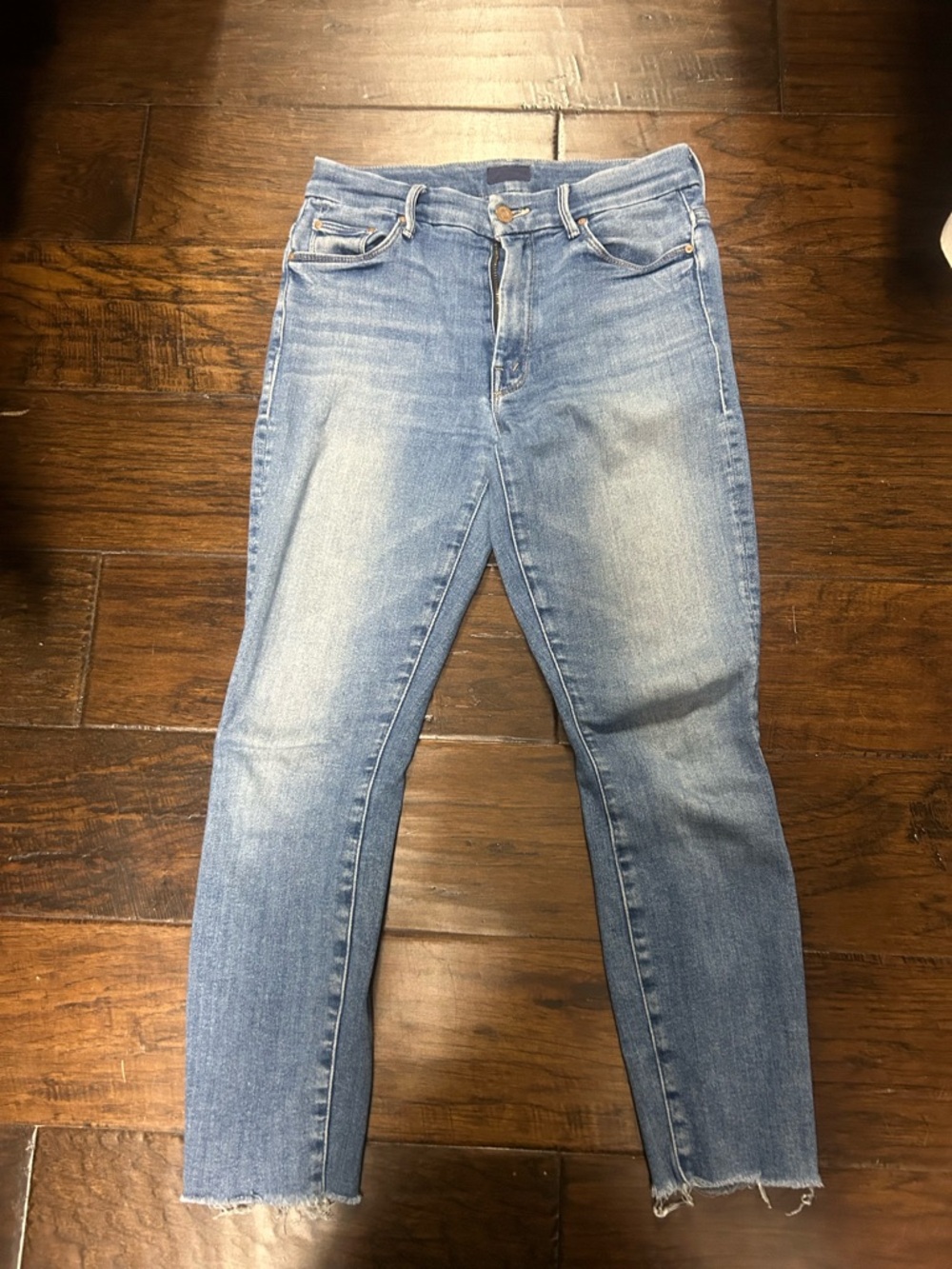 MOTHER the looker distressed Light Wash Skinny Jeans in Faded Blue